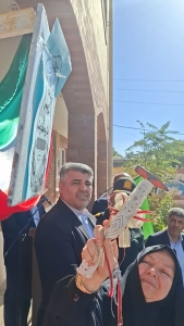 تصویر آغاز سال تحصیلی مدارس ساوجبلاغ با نواختن زنگ مهر در مدرسه شهیده محدثه علیزاده